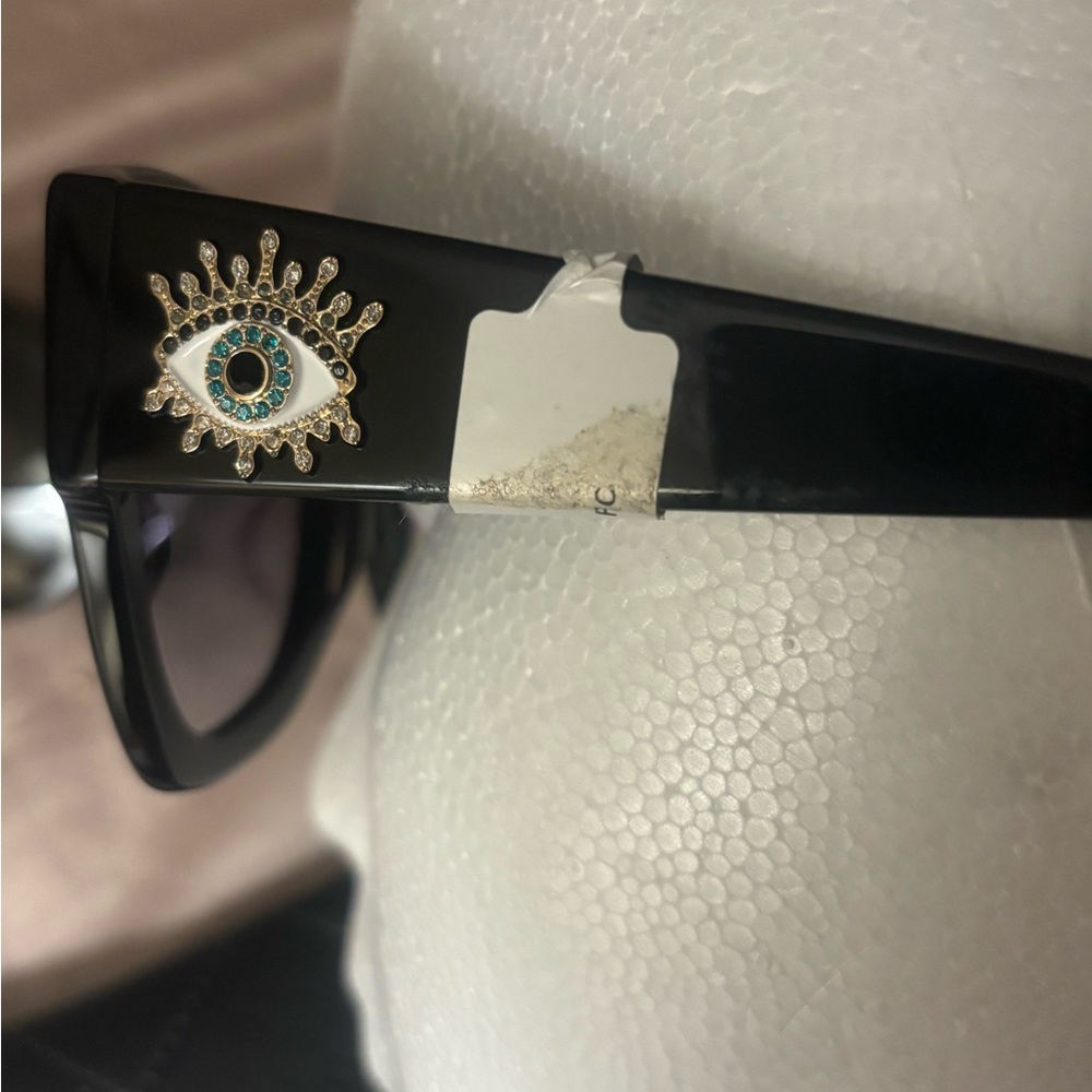 Kurt Geiger Black Sunglasses with Eye Details - Picture 4 of 6